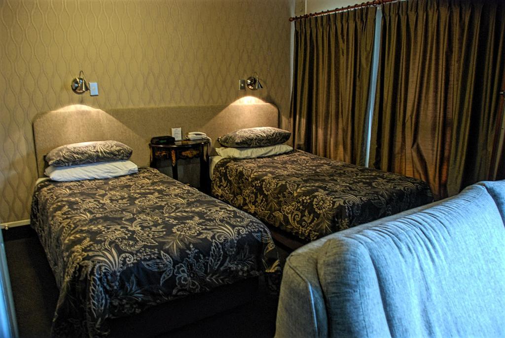 Fountain City Motor Inn Hamilton Rom bilde